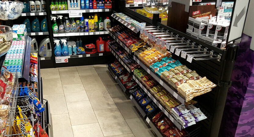 Stanchion posts with merchandising accessories