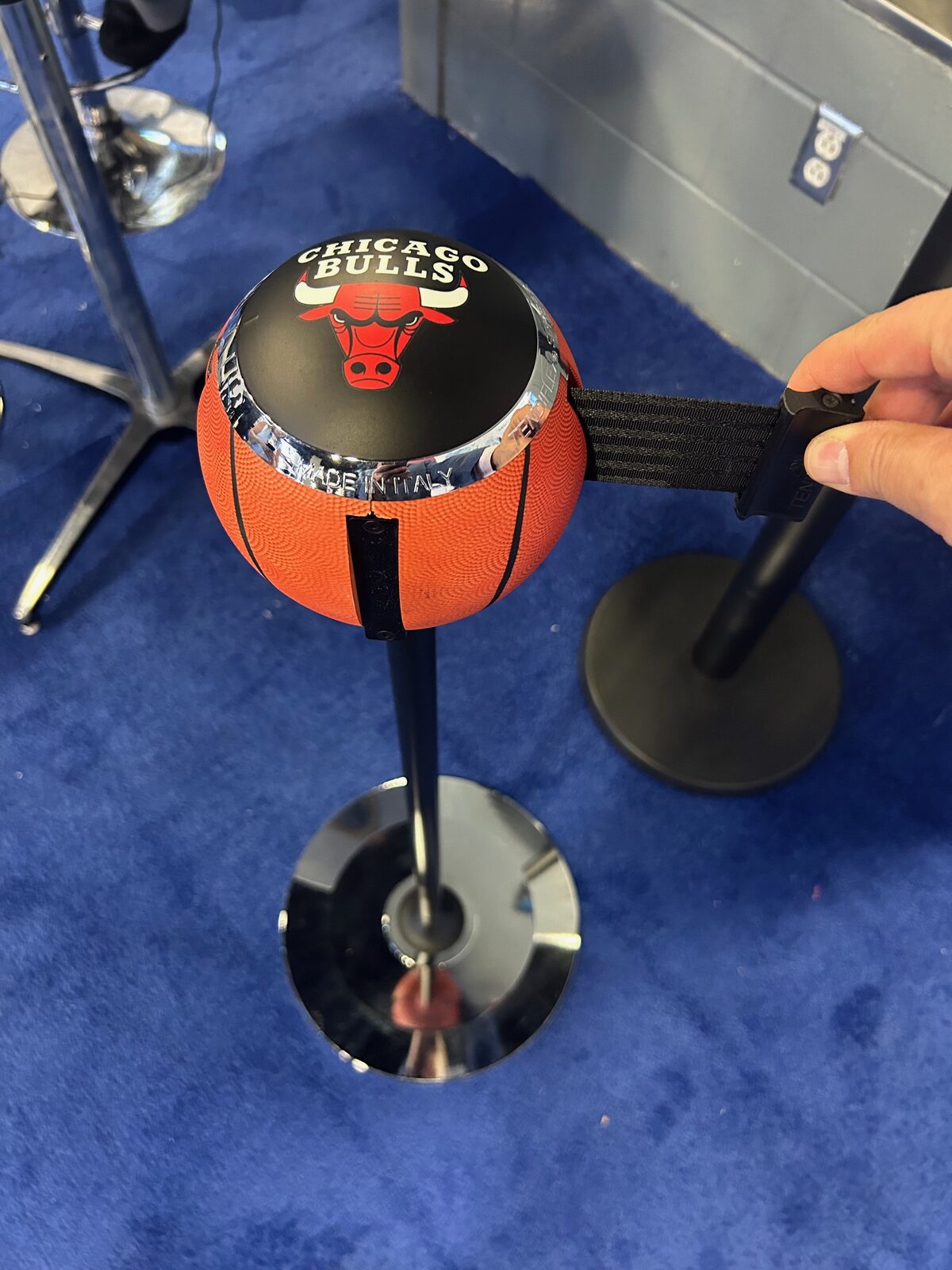 Custom basketball-shaped stanchion topper with team branding