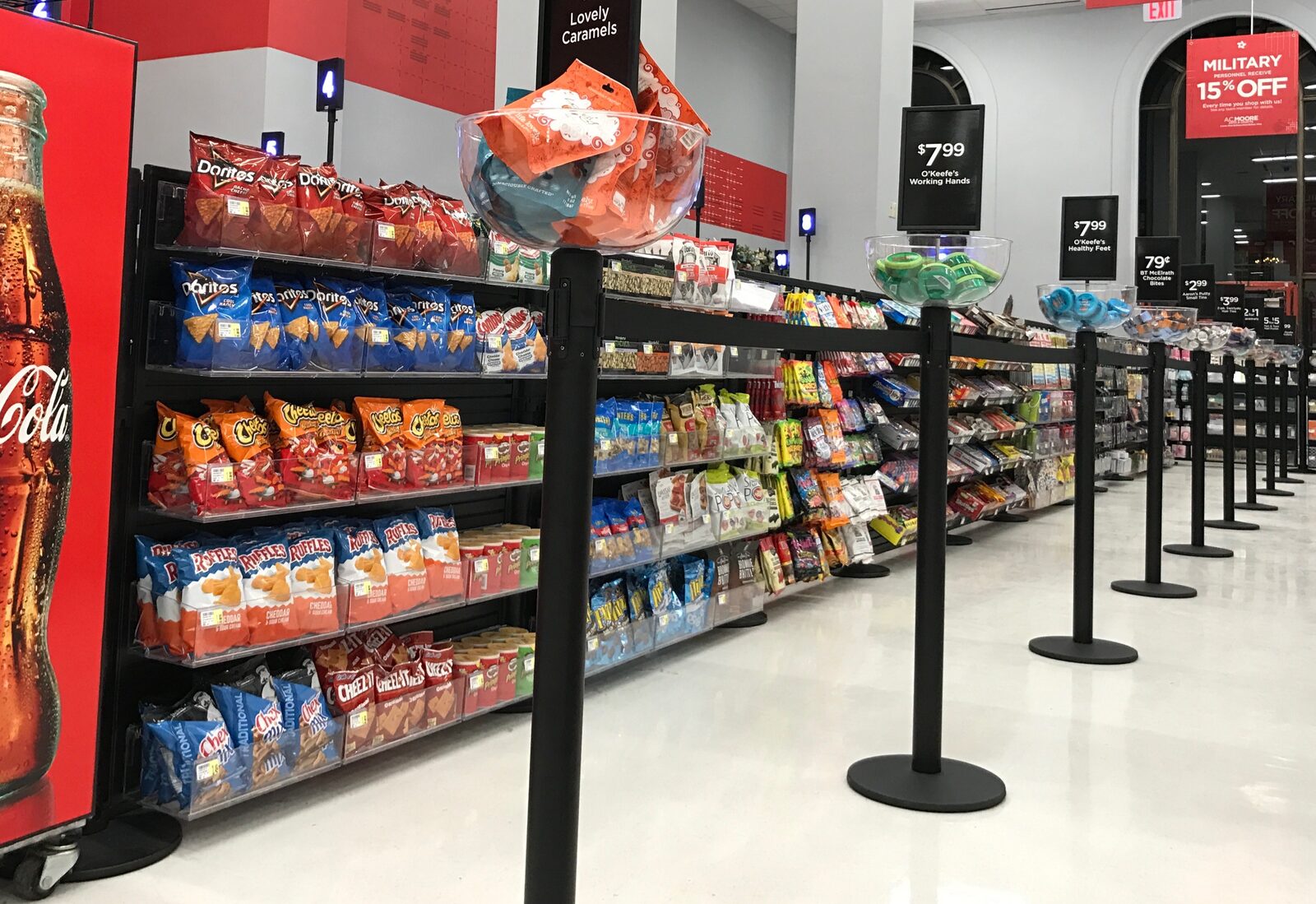 In-queue impulse merchandising display at A.C. Moore craft store