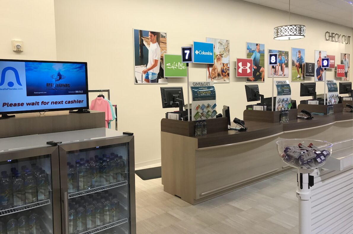 Qbuster customer checkout display units showing register numbers