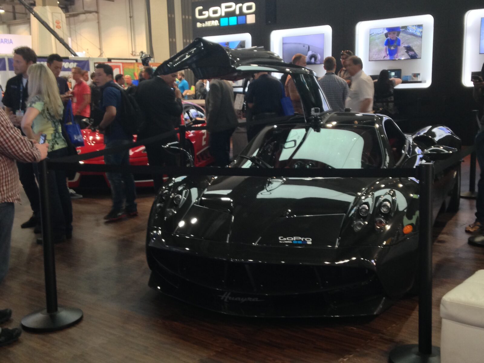 Stanchions protecting a Lamborghini display at a GoPro trade event